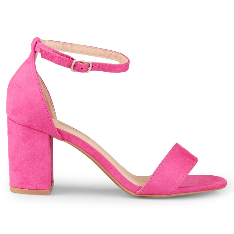 Sandali classici fucsia sul palo rosa