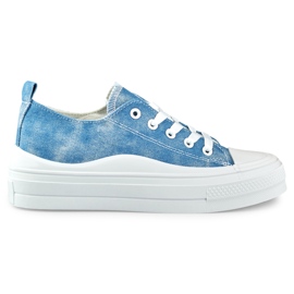 Sneakers in denim da donna sulla piattaforma blu