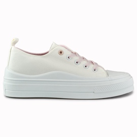 Sneakers bianche da donna sulla piattaforma bianca
