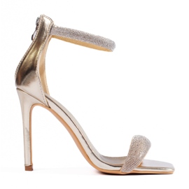 Sandali eleganti su un tacco alto Shelovet oro d'oro