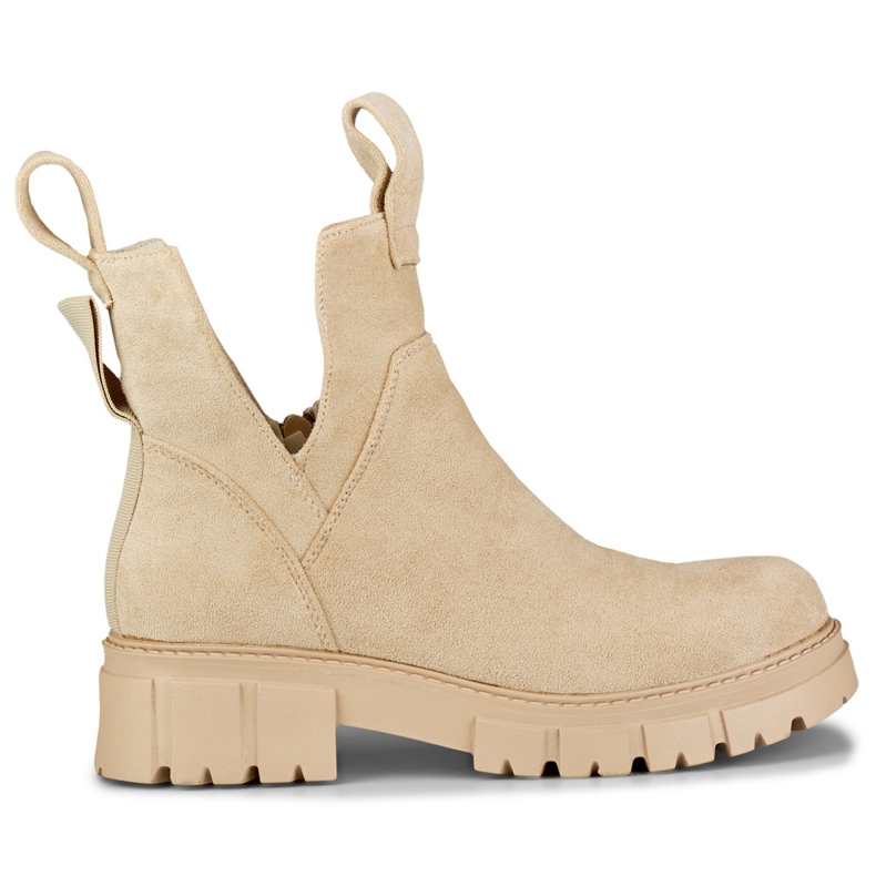Stivali da donna beige chiaro sulla piattaforma
