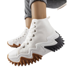 Scarpe da ginnastica sportive bianche con suola spessa di Toro bianco