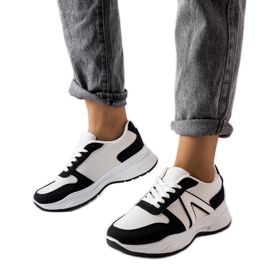 Scarpe da ginnastica sportive bianche e nere di Tornano bianco