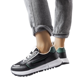 Inna Sneaker nere con accento verde Tod nero