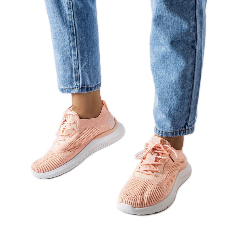 Scarpe da ginnastica arancioni e bianche di Nelson arancia