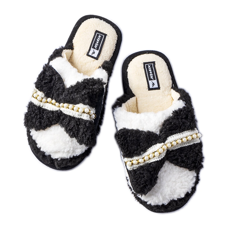 Pantofole bianche e nere con fiocco nero