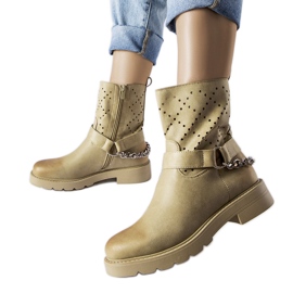Stivaletti verdi traforati con catena Procopio beige