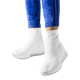 Sneakers in tessuto bianco con zeppa Casgio