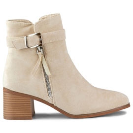 Stivaletti beige con tacco basso e fibbia