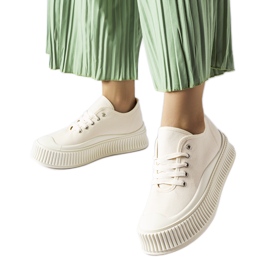 Sneakers beige su una spessa piattaforma Rina
