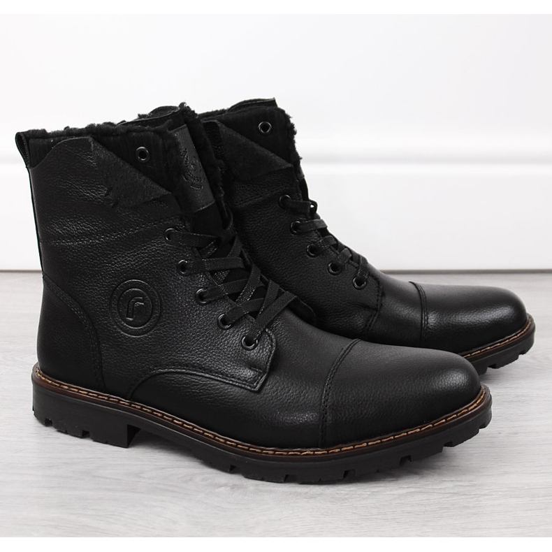 Stivaletti in pelle scarpe da uomo isolate con lana, nero Rieker 32133-00
