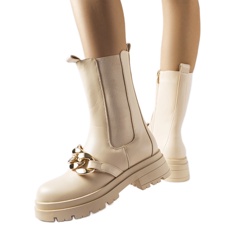 Stivaletti beige con catena di Thierry