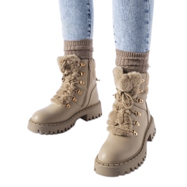 Pantaloni da lavoro beige con pelliccia decorativa di Quarto