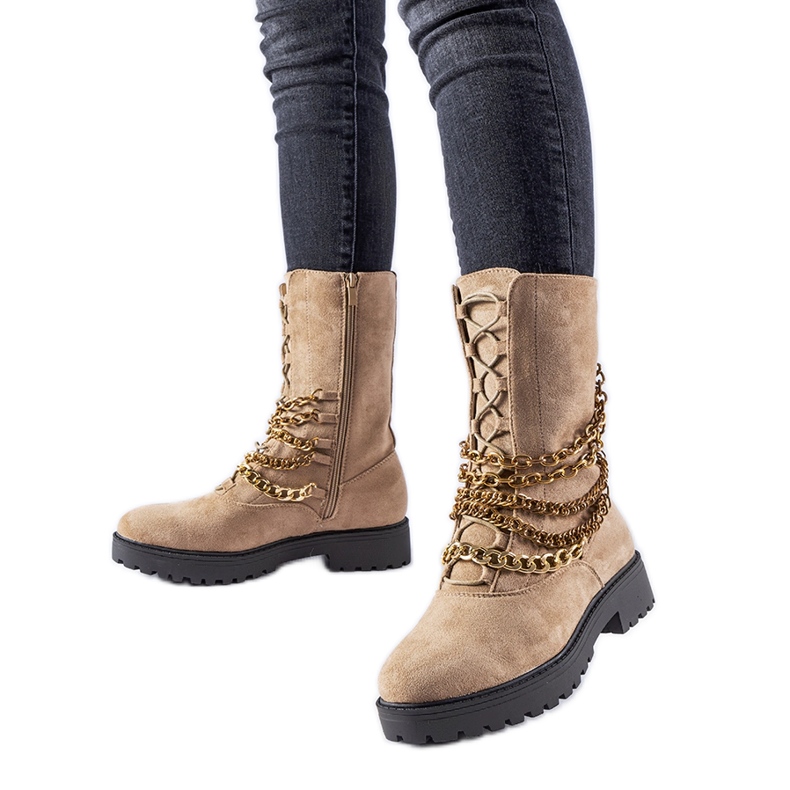Stivaletti isolanti beige con catena Carroll