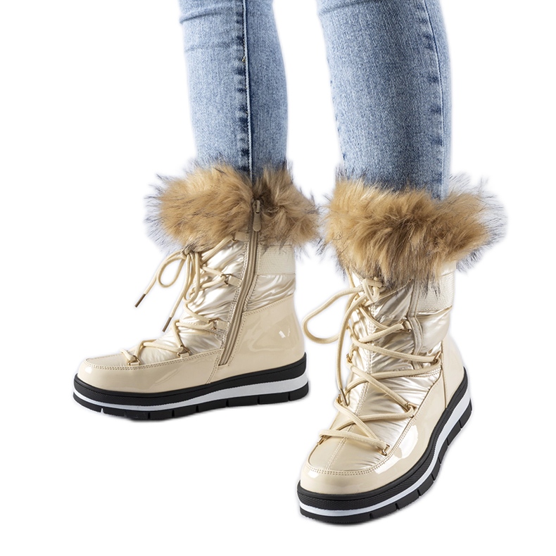 Doposci in vernice beige con pelliccia Bow