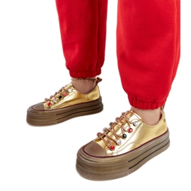 Sneakers dorate sulla piattaforma GOE NN2N4055 d'oro