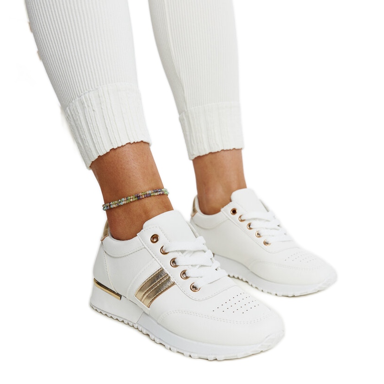Sneakers bianche e oro sulla piattaforma in gomma Nihad bianca
