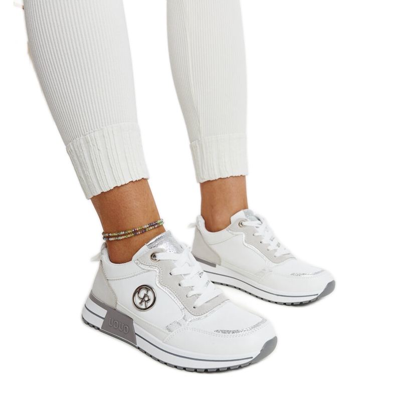 Sneakers con plateau bianche e grigie di Sinika bianca