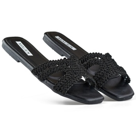 Infradito da donna in pizzo nero con suola piatta
