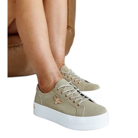 Scarpe sportive in pelle verde con decorazione
