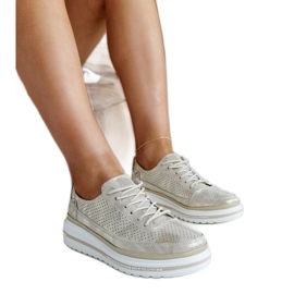 Sneakers con zeppa in pelle color oro pianoforte d'oro