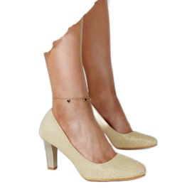 Décolleté oro lucido con sottopiede in pelle Antibies d'oro