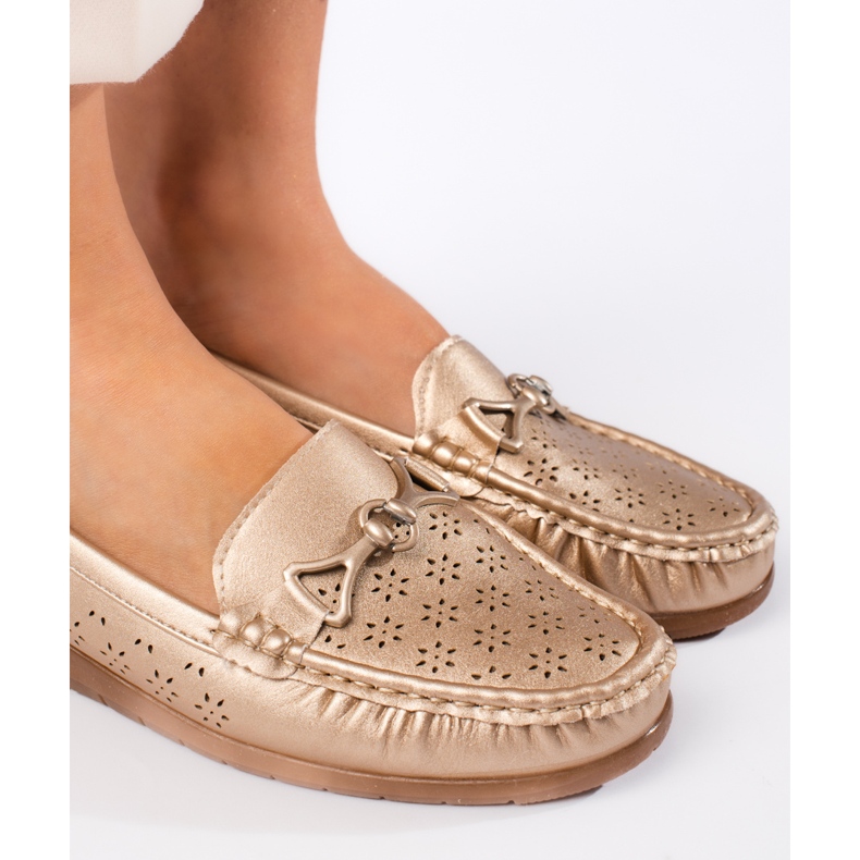 Mocassini dorati da donna d'oro