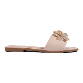 Infradito da donna beige con decorazione