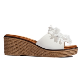 Mules con zeppa in camoscio bianco