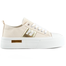 Sneaker da donna beige alla moda con suola spessa e plateau