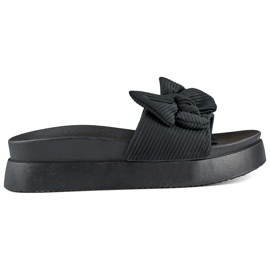 Pantofole da donna nere con fiocco su suola spessa nero