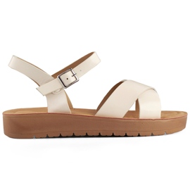 Sandali bassi da donna beige realizzati in ecopelle