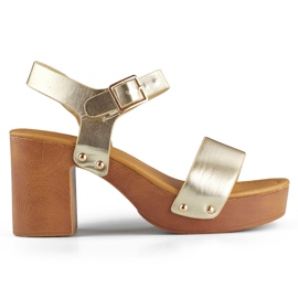 Sandali dorati con tacco platform in legno d'oro