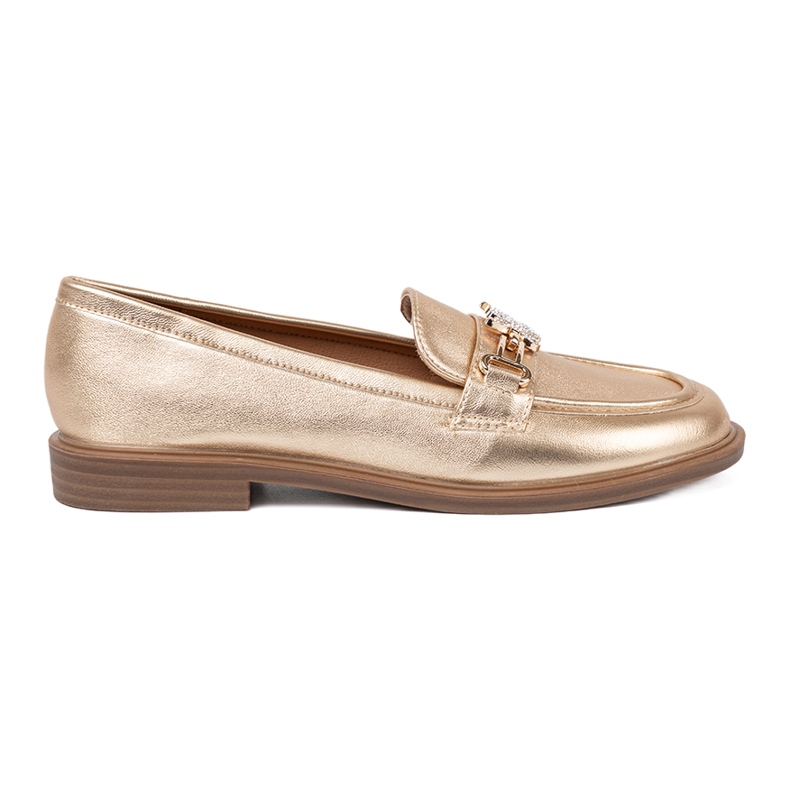 Mocassini dorati da donna alla moda d'oro