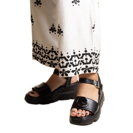 Sandali neri con zeppa realizzati in ecopelle Maddison nero