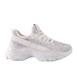 Sneakers bianche lucide con un'enorme suola Senai bianco