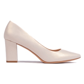 Comode décolleté beige di Sergio Leone