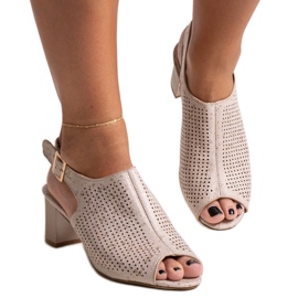 Sandali traforati con tacco alto e sottopiede in pelle di Mawiya beige