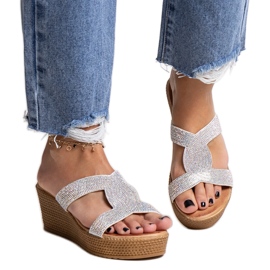 Mules con zeppa in argento e zirconi Antuanet