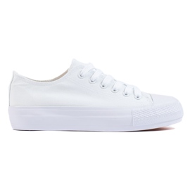 Sneakers bianche da donna sulla piattaforma bianco