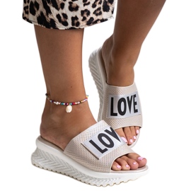 Mules beige con zeppa Maurla decorativa