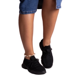 Sneakers in tessuto nero di Madi