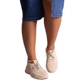 Sneakers in tessuto beige di Madi