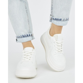 Sneakers bianche da donna con suola spessa bianco