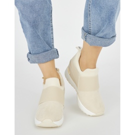 Sneakers con zeppa da donna di colore beige chiaro