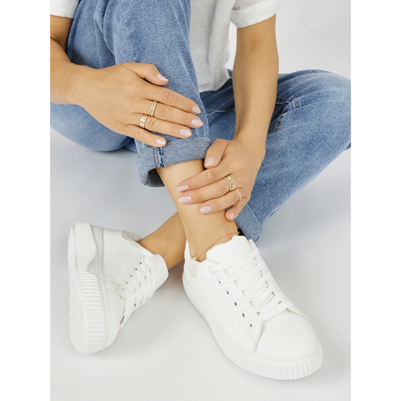 Sneakers da donna bianche con un elemento beige bianca