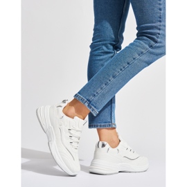 Scarpe sportive da donna bianche con suola spessa bianco