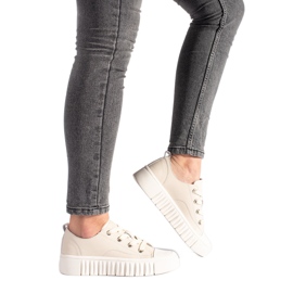 Sneakers da donna in pelle beige