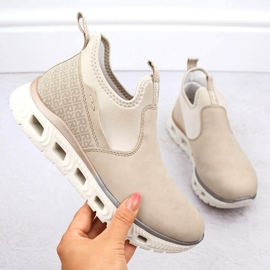 Scarpe slip-on comode, alte, beige da donna Rieker M6053-62