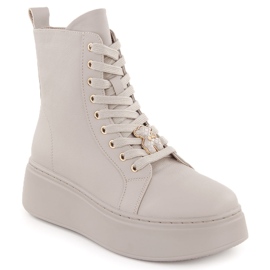 Stivali in pelle beige su plateau con orsetto Vinceza 66701